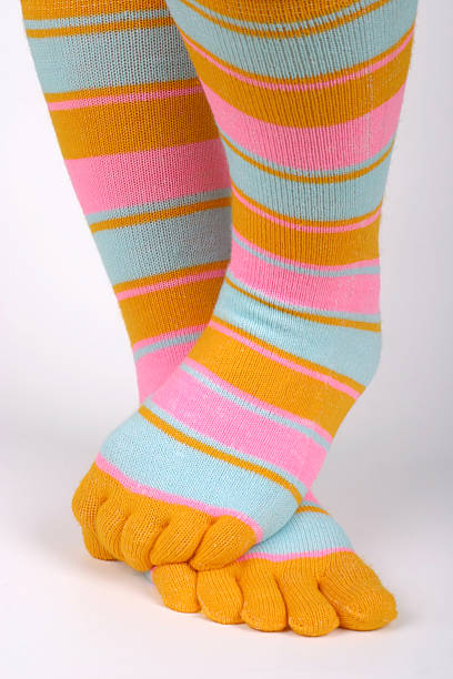 istock legs with colorful socks 146778975