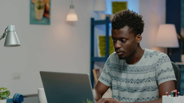 istock Freelancer person working from home with laptop 1467792808