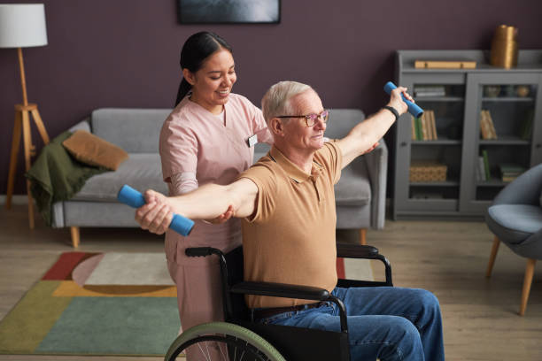 istock Senior man with disability doing exercises with dumbbells 1467798382