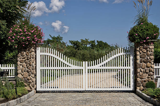 istock White gate in front of a house 146780513