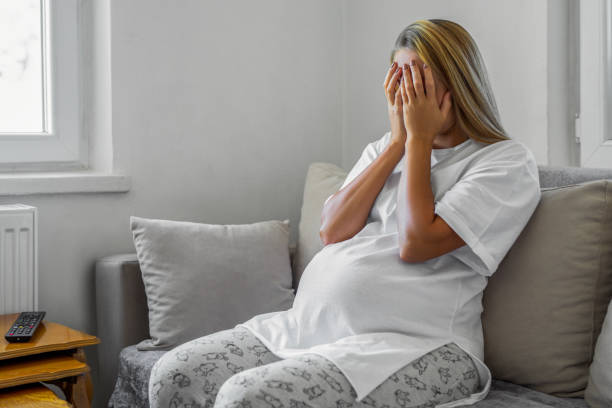 istock Pregnant mother with depression and stress 1467807373