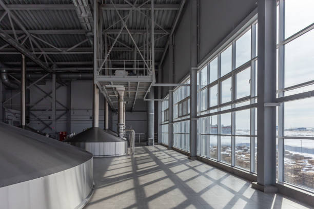 istock Big fermentation tanks at spirit plant. 1467813701
