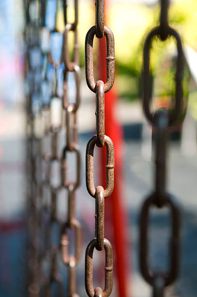 Links in a chain Links in a chain tug o stock pictures, royalty-free photos & images