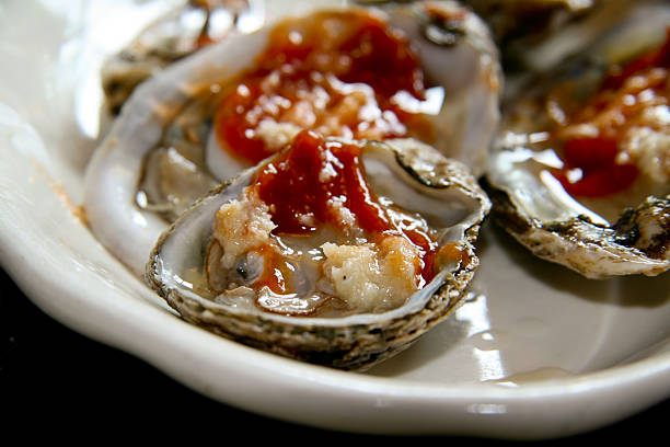 Oysters with Cocktail Sauce stock photo