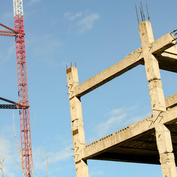 istock Modern building process. Unfinished residential building. 1467818315