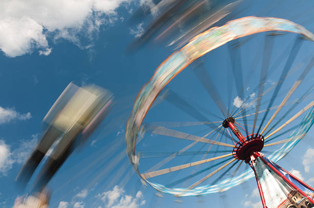 Whirling carousel on the sky stock photo