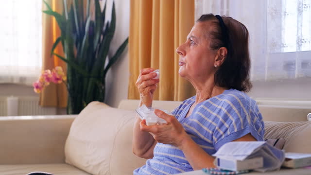 Menopausal mature woman eating ice