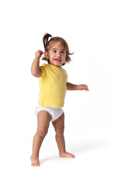 istock Baby girl standing on white background 146782106