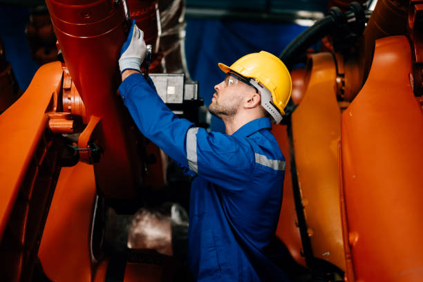 istock Professional worker maintenance machine robotic arms industrial machinery 1467823788