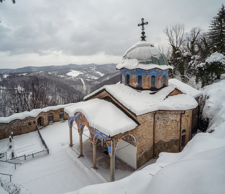 Amazing winter landscape with the beautiful snow-covered Sokolski Monastery near Gabrovo, Bulgaria