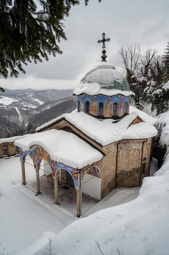 Amazing winter landscape with the beautiful snow-covered Sokolski Monastery near Gabrovo, Bulgaria
