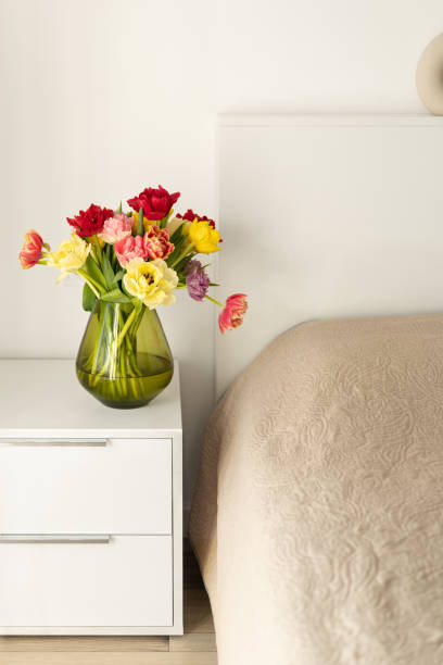 istock Colorful tulips on the bedside table. 1467829455