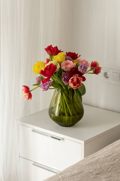 istock Colorful tulips on the bedside table. 1467829467