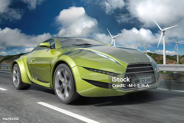 Image Of Lime Green Sports Car On A Cloudy Day Stock Photo - Download Image Now - Driving, Wind Turbine, Car