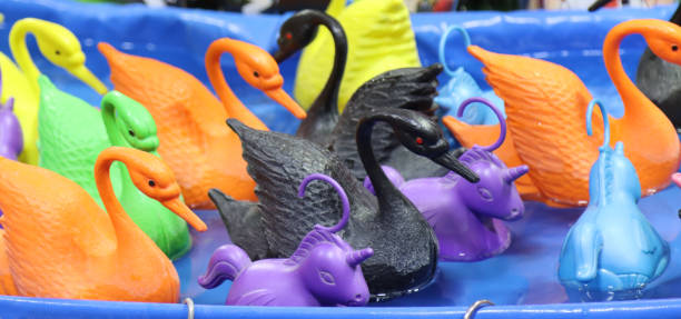 istock carousel amusement park fishing attraction numbered swans- 1467834648