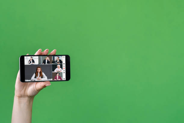 istock mobile conference female business team on screen 1467836629