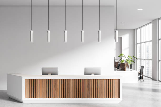 istock Light office room interior with reception and coworking area near window 1467839363