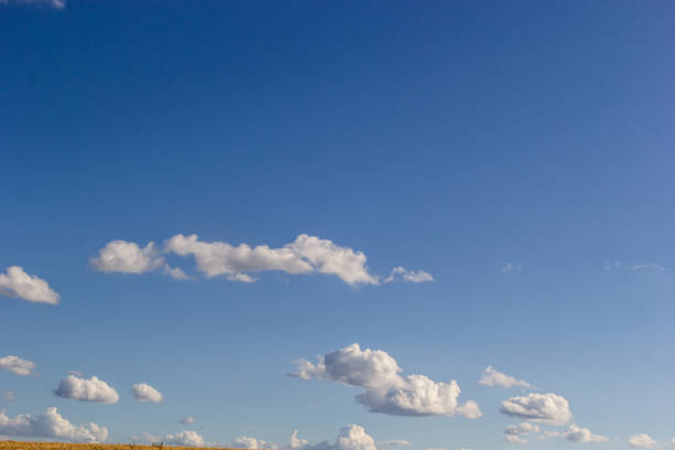 istock clouds in the sky lit by the sun on a summer day. background 1467839370