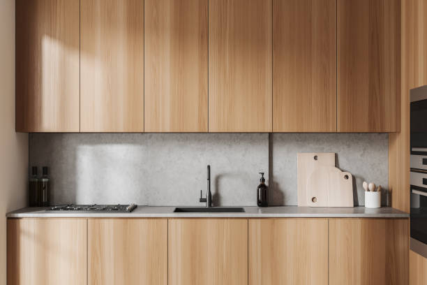 istock Stylish kitchen interior with sink, stove and kitchenware 1467840244