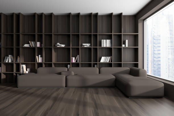 istock Brown meeting room interior with couch and minimalist shelf, panoramic window 1467840350