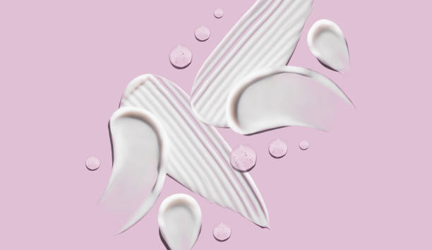 istock cosmetic smears cream texture on pink background 1467842055