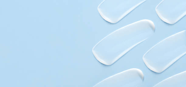 istock cosmetic smears cream texture on pastel blue background 1467842309