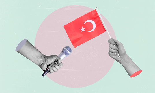 Art collage, collage of a hand holding the flag of Turkey, microphone in the other hand.