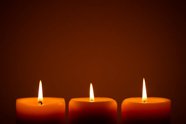 istock Burning candles in the dark 1467845485