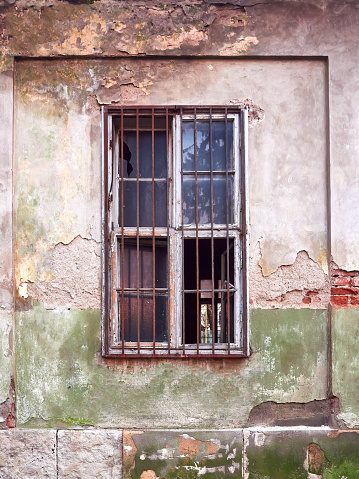 Old plastered wall with window