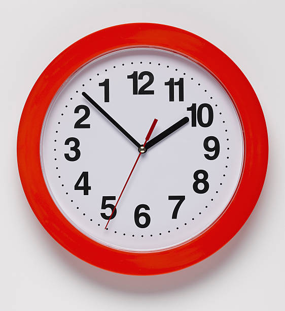 Backwards Clock Clock with backwards face back to front stock pictures, royalty-free photos & images