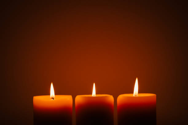 istock Burning candles in the dark 1467847569