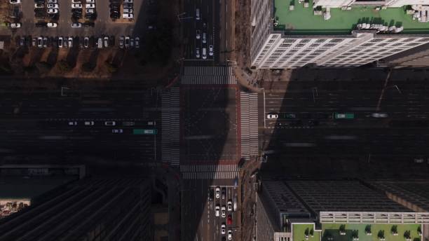istock Looking from the sky at a fast-moving vehicle at the intersection 1467847843