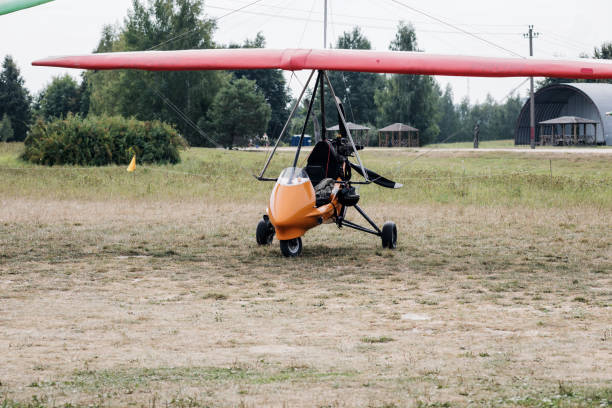 istock paraglider with motor is standing on ground 1467847872
