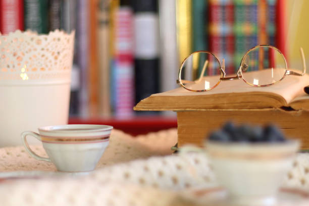 istock Tea, Books, Tablet, Cookies and Candles 1467849570