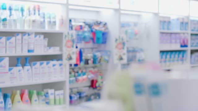 Inside overview of pharmacy shelves with items and medicines