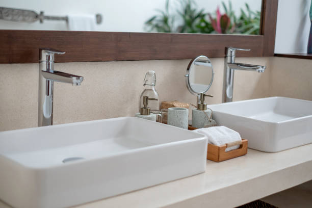 istock Clean Bathroom Sink With Various Toilet Amenities 1467851932