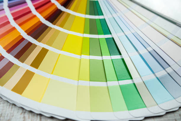istock catalog in bright color palette close-up on desk 1467852908