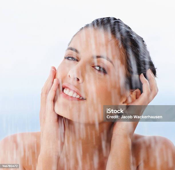 Closeup Of A Cute Young Woman Under The Shower Stock Photo - Download Image Now - 20-24 Years, 20-29 Years, Adult