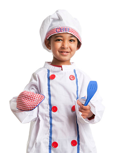 Smiling Toddler dressed as a Chef, isolated on white stock photo