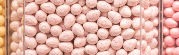 Pastel pink candies in a shop window