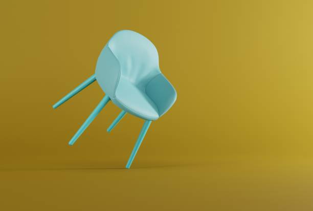 istock Classic style chair on a dark yellow pastel background. 1467859653