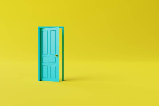 istock The closed yellow door on a yellow background. 1467861345