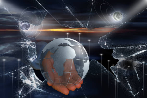 istock A look into space, infinity through broken glass. Earth globe in human hand through broken glass. Global network and data exchange in human hands 1467861401