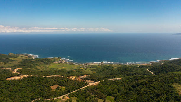 istock Tropical landscape with mountains and sea. 1467861762