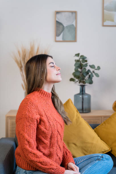 istock Young woman with closed eyes 1467862367