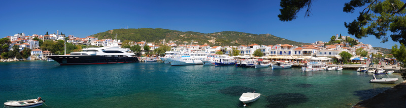 Panorama of Skiathos Town harbor on Skiathos Island, Sporades Archipelago, Greece, Europe, taken from the Bourtzi center on a sunny summer day
