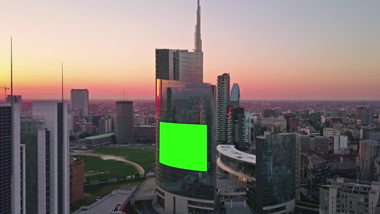 blank advertising billboard on city skyscrapers aerial view