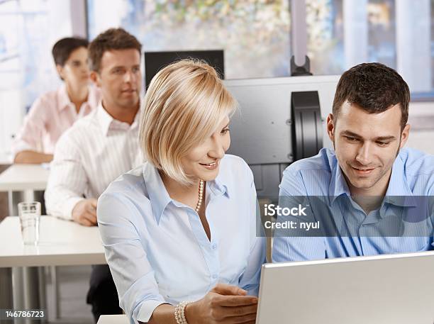 Smiling Professional People With Computers Stock Photo - Download Image Now - 20-29 Years, Adult, Adult Student