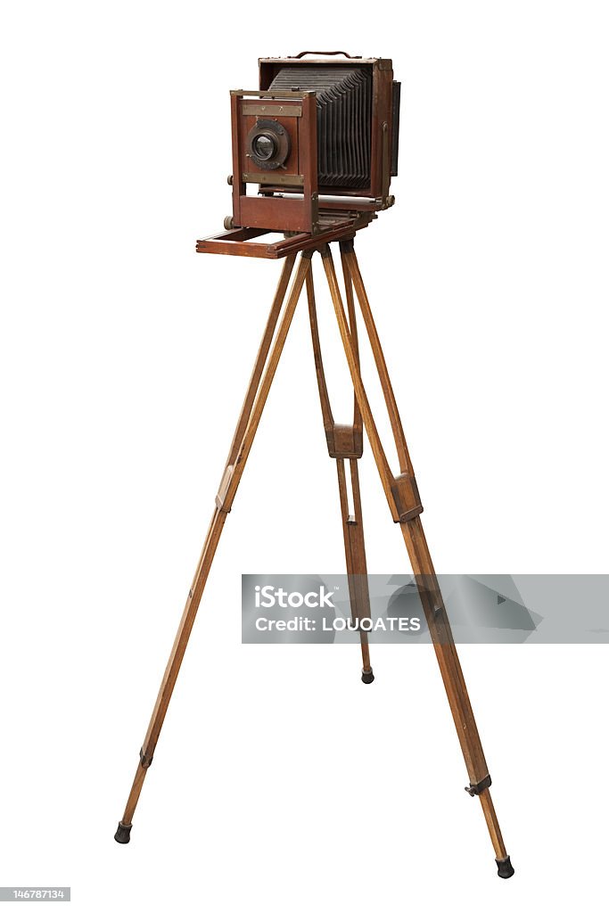 WoodenViewCamera Antique wood view camera and tripod. Isolated with work path. Camera - Photographic Equipment Stock Photo
