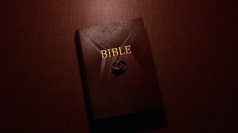 Holy Bible book on table.